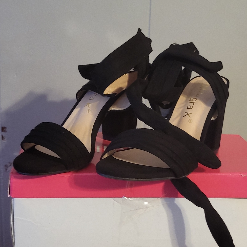 Black size 5 tie up heels